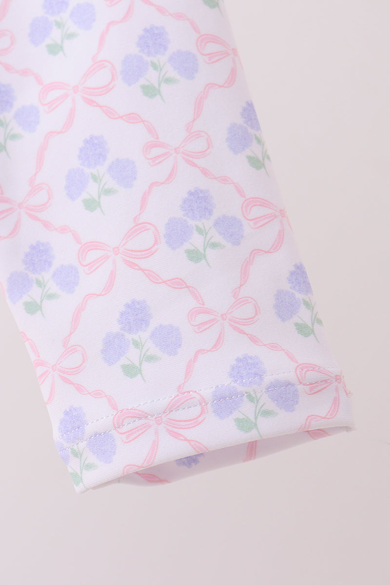 Haut anti-UV rose à volants imprimé floral