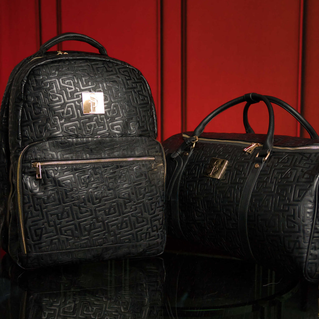 Ensemble de 2 sacs en cuir monogrammé (sac de voyage et sac de sport)