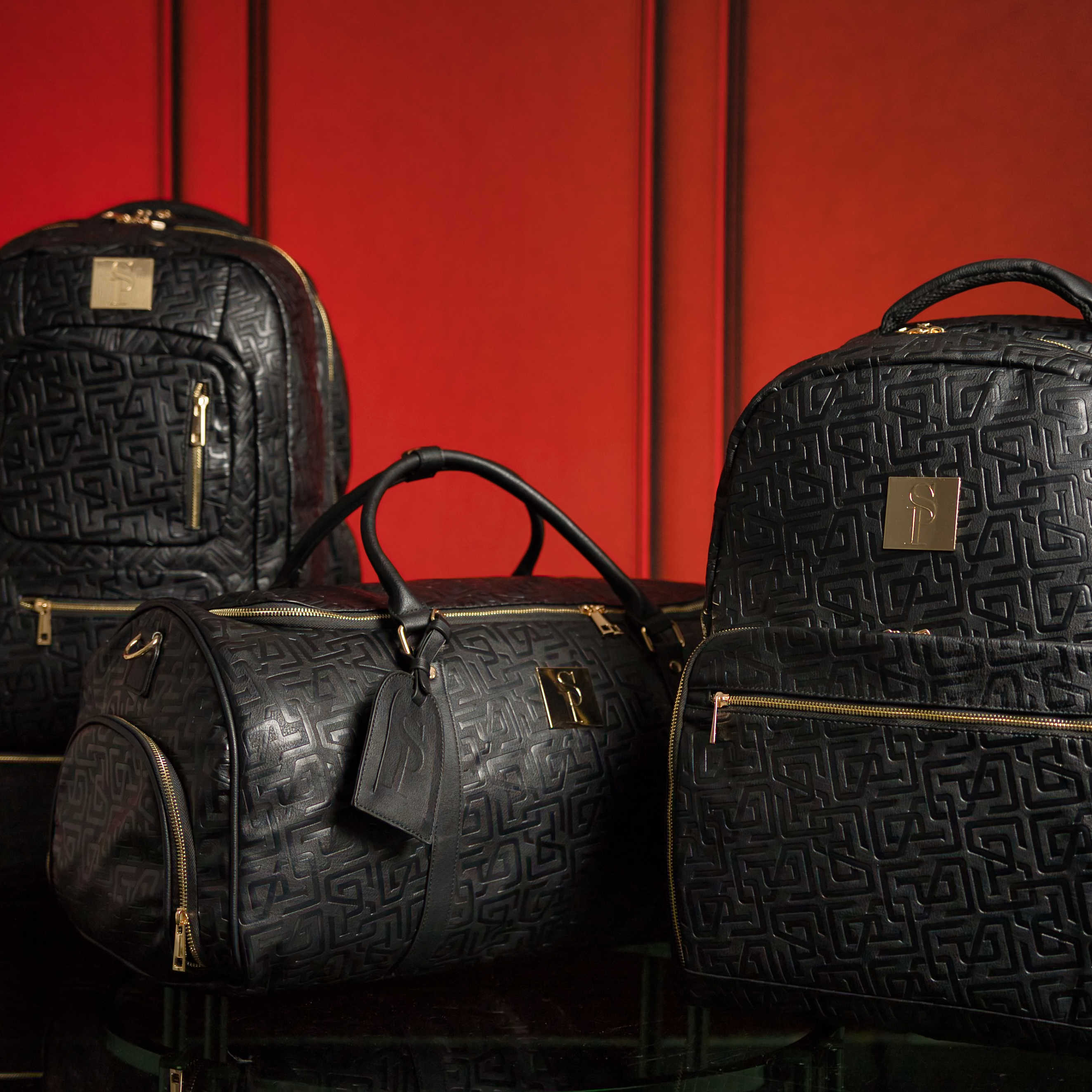 Lot de 3 sacs en cuir monogrammé (Sac à dos Signature, Sac de voyage et Sac polochon)