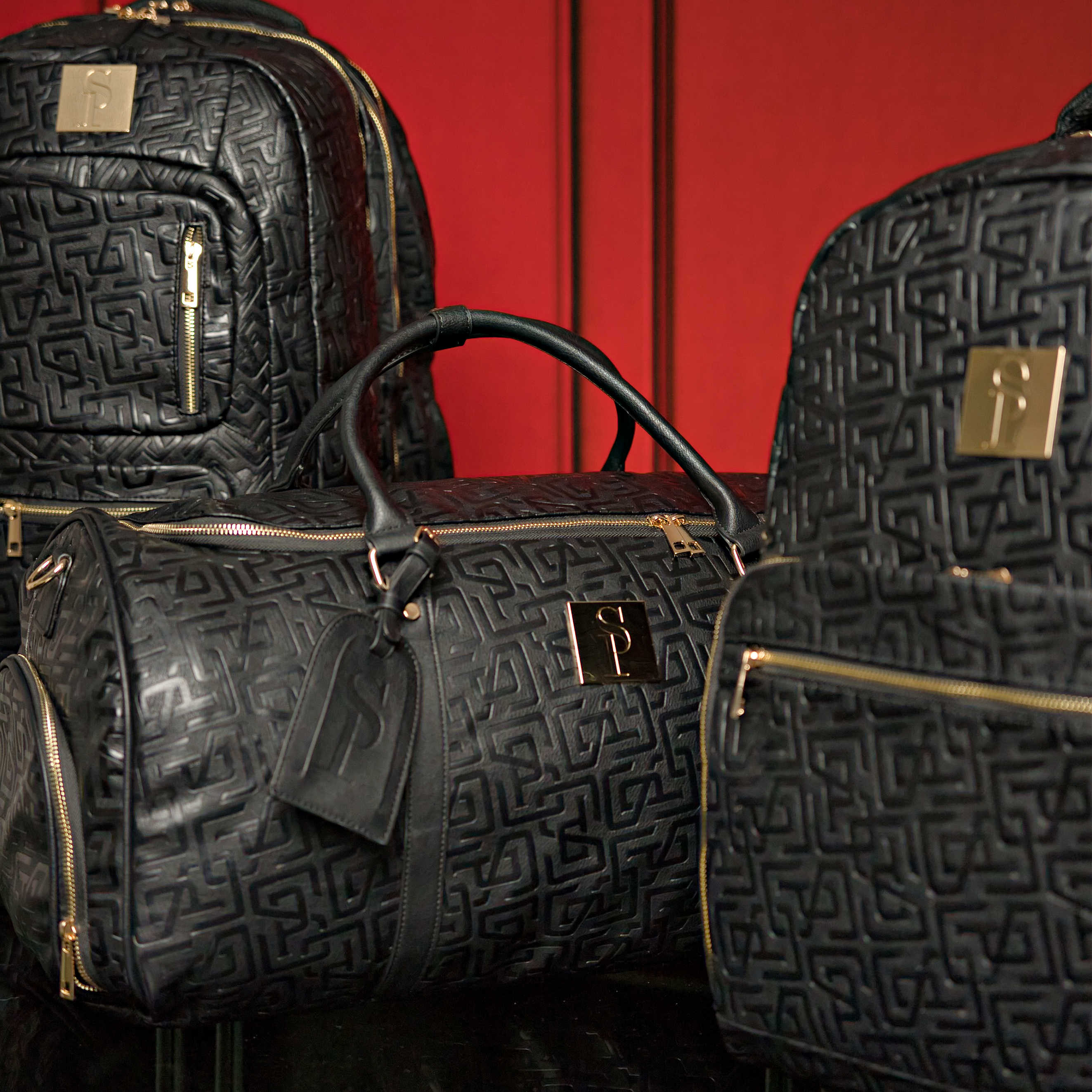 Lot de 3 sacs en cuir monogrammé (Sac à dos Signature, Sac de voyage et Sac polochon)