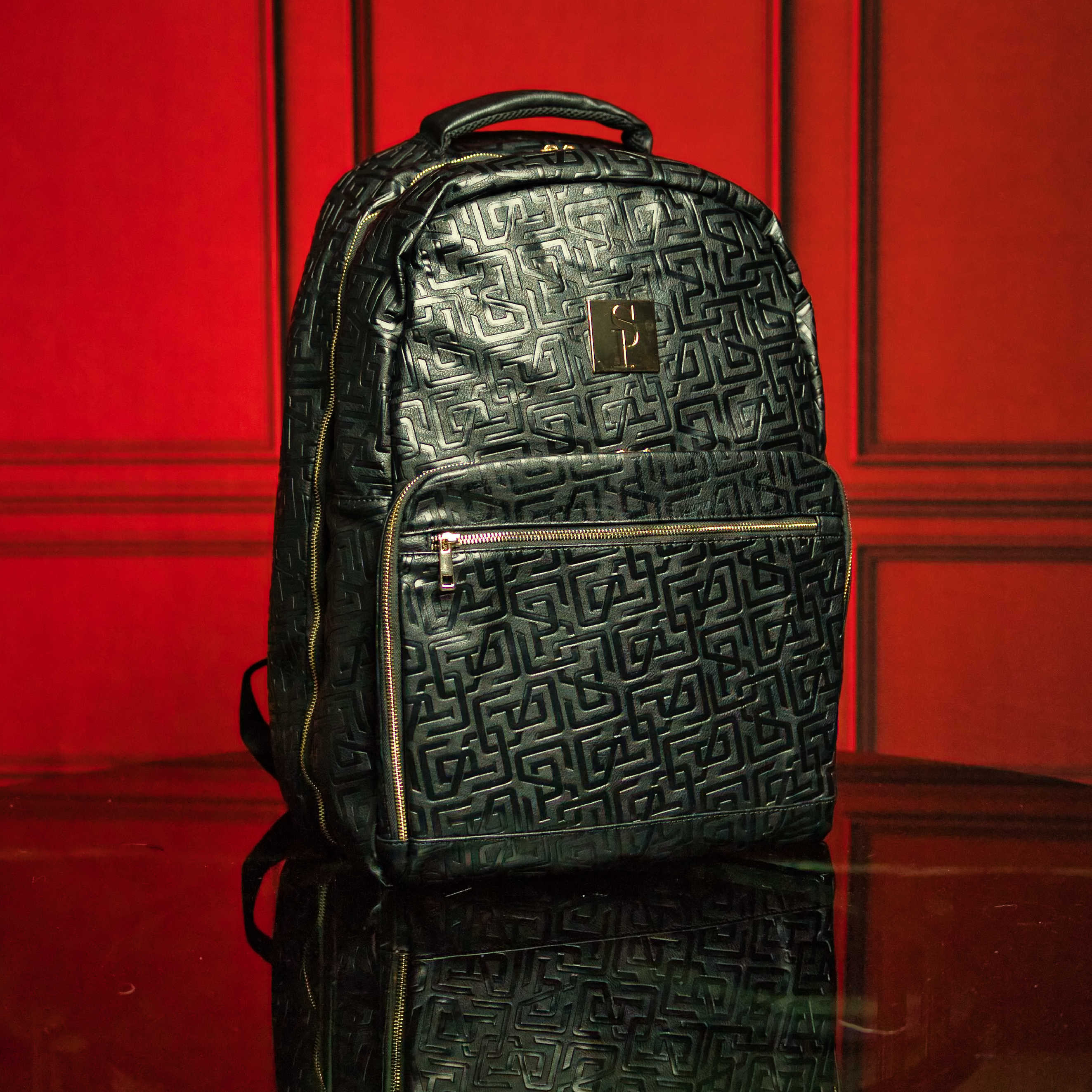 Lot de 3 sacs en cuir monogrammé (Sac à dos Signature, Sac de voyage et Sac polochon)