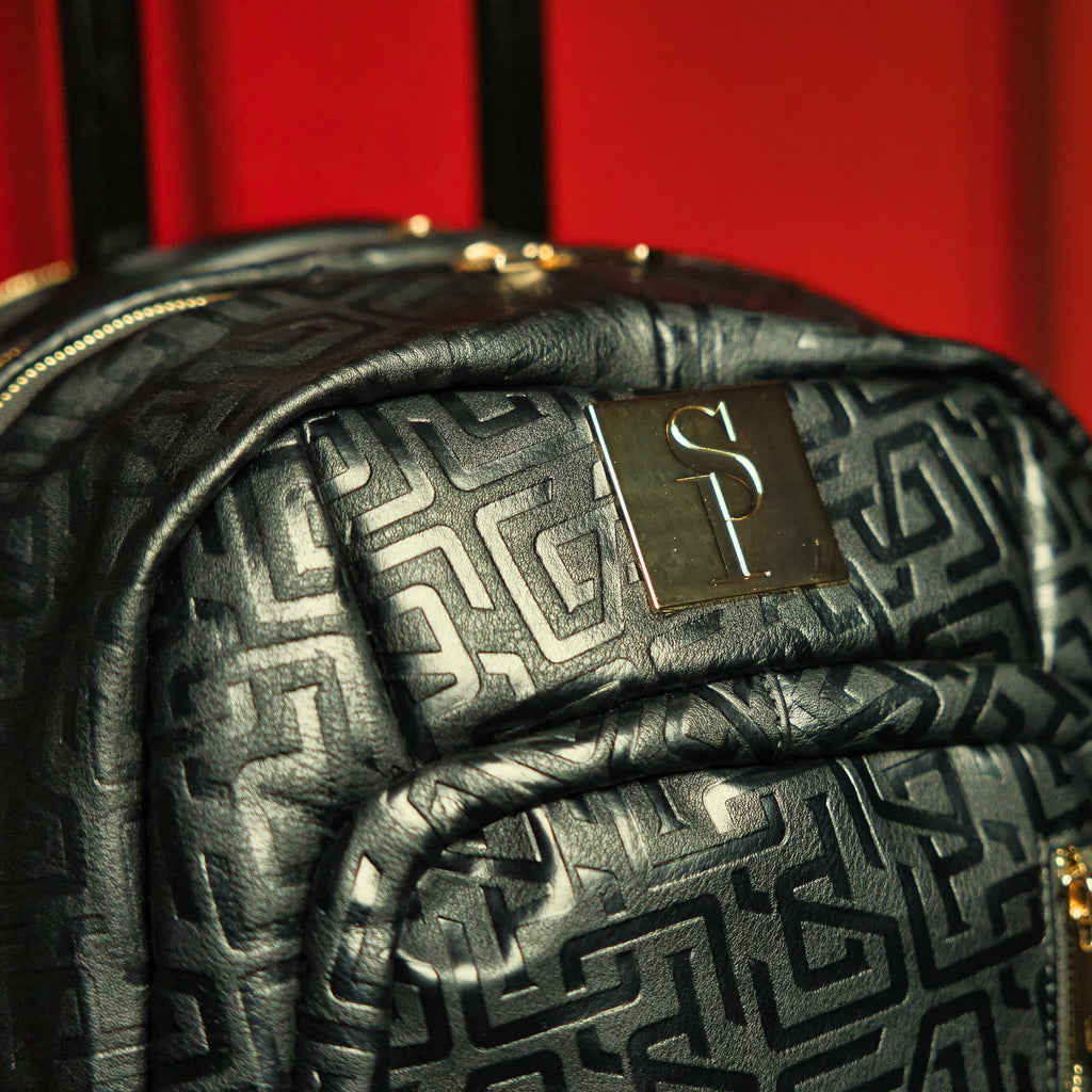 Sac de voyage à roulettes en cuir noir monogrammé (édition limitée à 150 exemplaires)