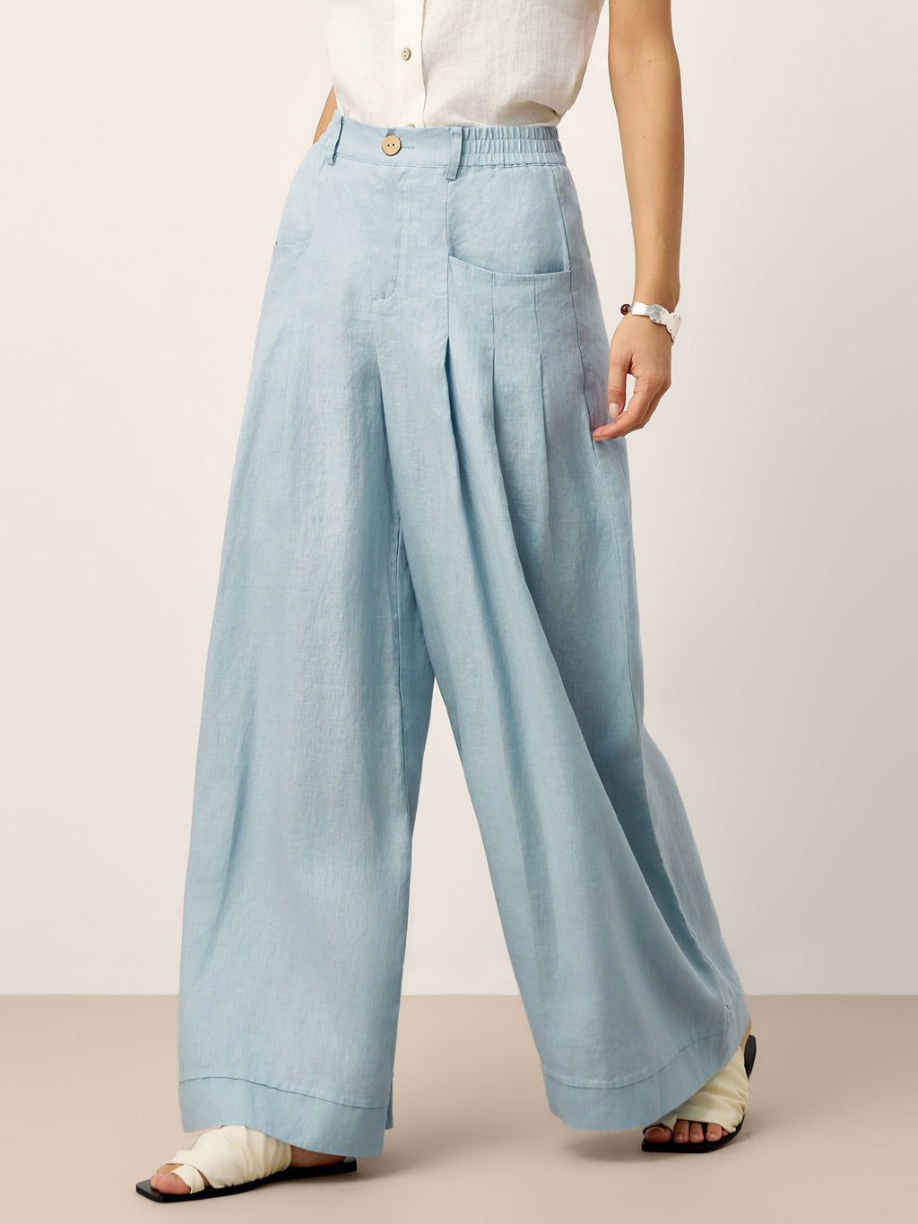 Pantalon VERIDIANA en 100 % lin, plissé sculpté et dos élastiqué, coupe décontractée