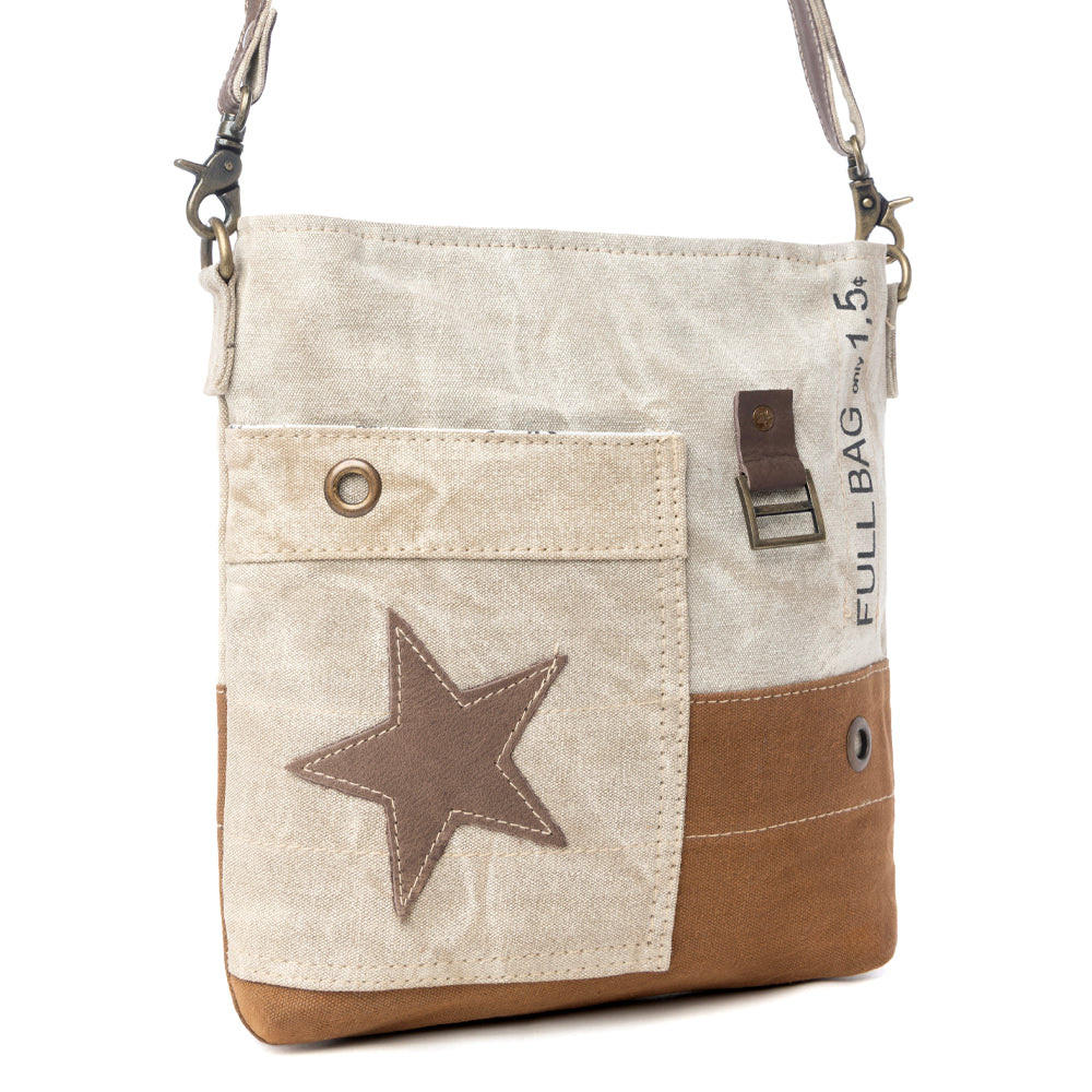 Petit sac bandoulière et sac porté travers en cuir