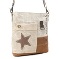 Petit sac bandoulière et sac porté travers en cuir
