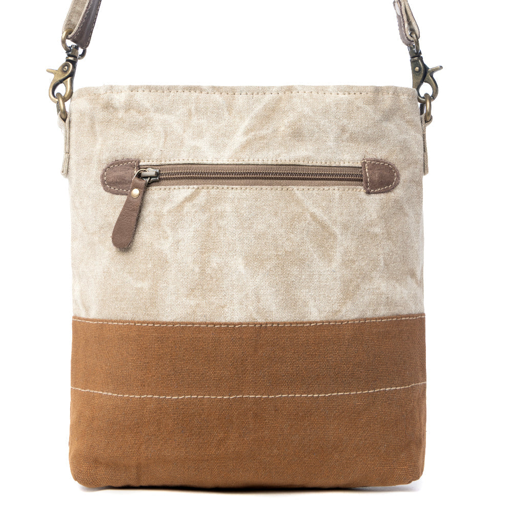 Petit sac bandoulière et sac porté travers en cuir