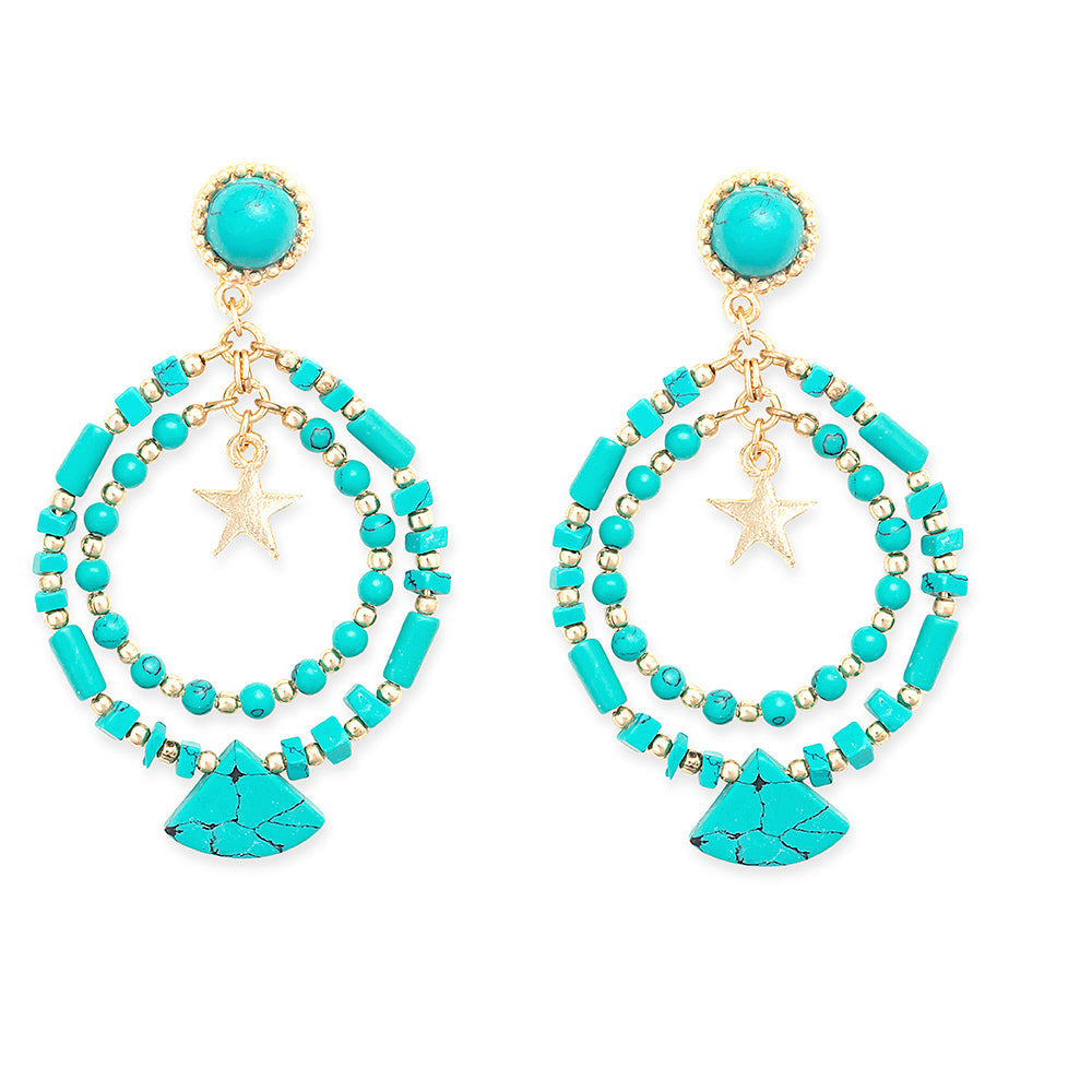 Deux boucles d'oreilles une étoile