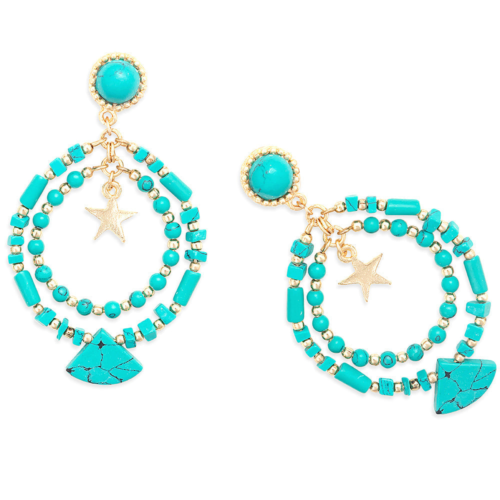 Deux boucles d'oreilles une étoile