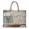 Sac de voyage en cuir et imprimé floral