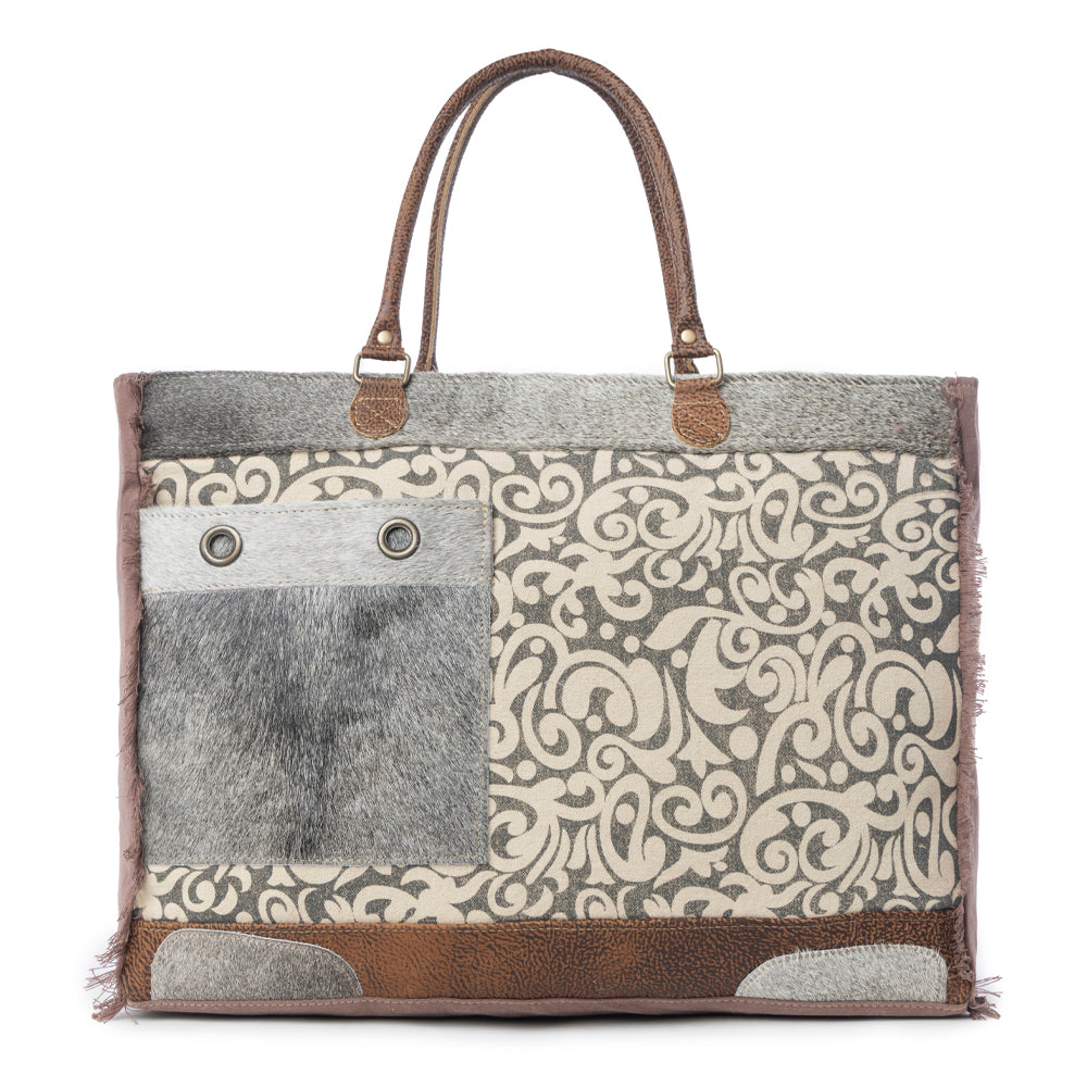 Sac de voyage en cuir et imprimé floral