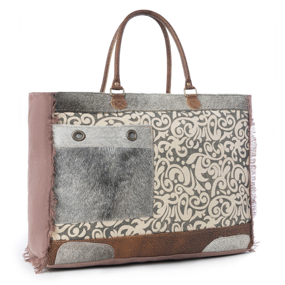 Sac de voyage en cuir et imprimé floral