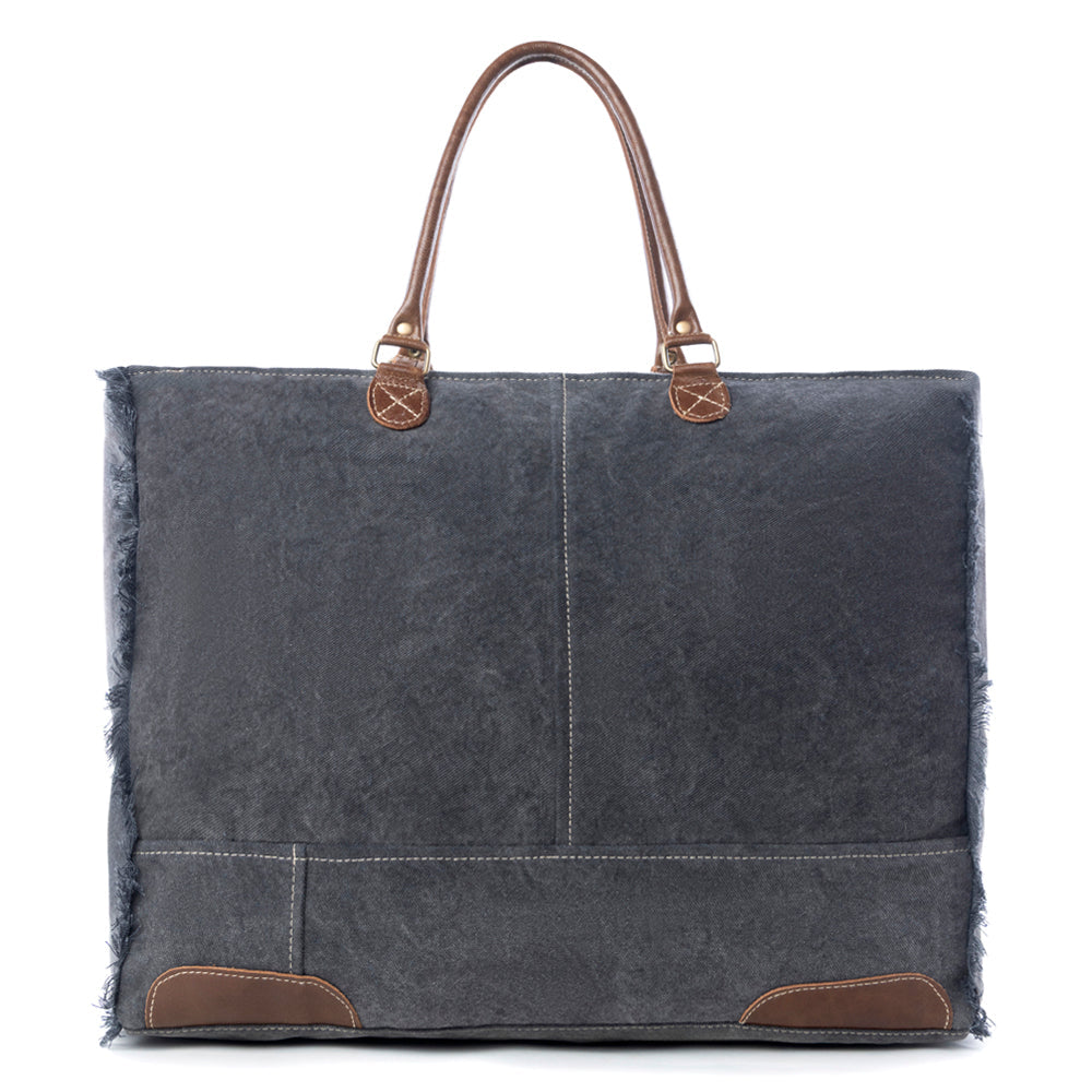 Sac de voyage Myra Dakota Trail en cuir et poils de vachette – Toile imprimée artisanale avec franges rustiques sur les côtés et anses en cuir