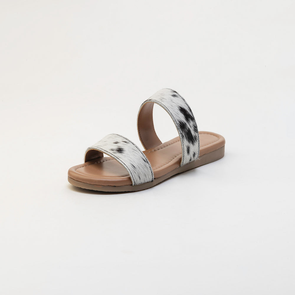Sandales en cuir Vaquero avec poil façon poulain noir et blanc
