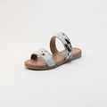 Sandales en cuir Vaquero avec poil façon poulain noir et blanc