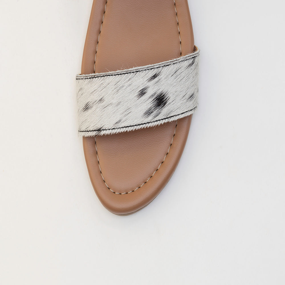 Sandales en cuir Vaquero avec poil façon poulain noir et blanc