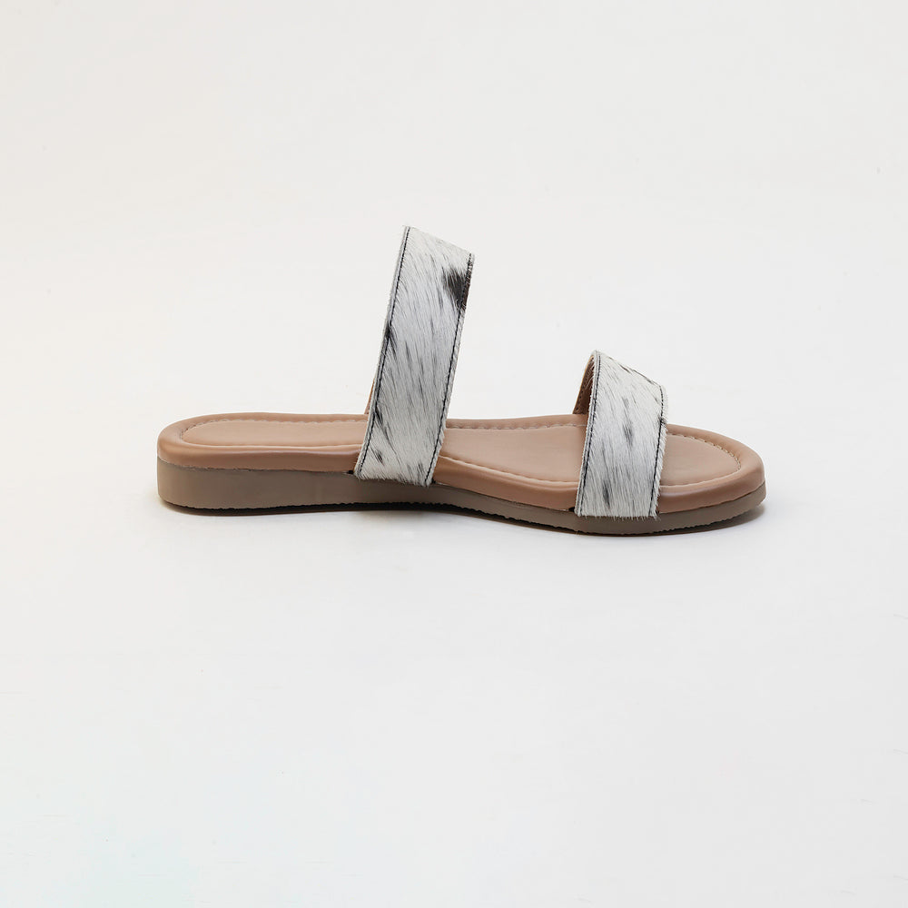 Sandales en cuir Vaquero avec poil façon poulain noir et blanc