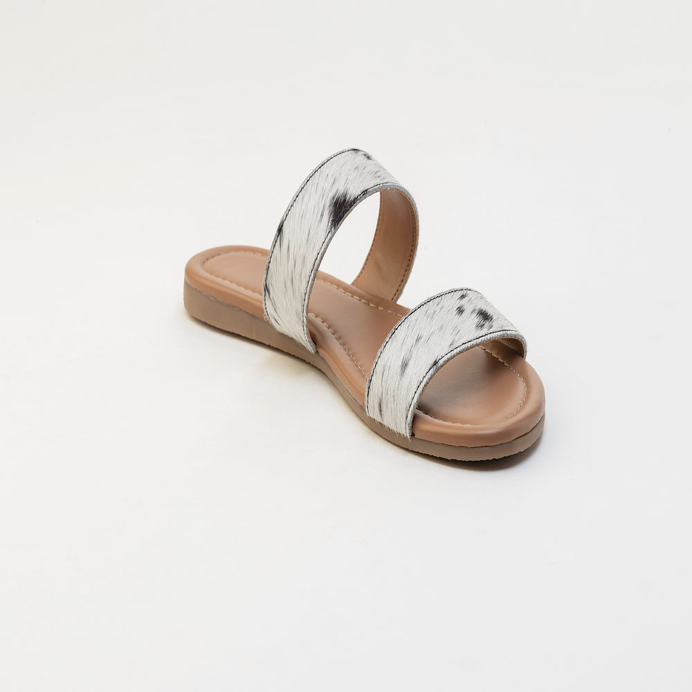 Sandales en cuir Vaquero avec poil façon poulain noir et blanc