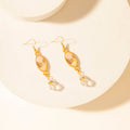 Boucles d'oreilles pendantes Myra Honey Crystal couleur Rouge Aube