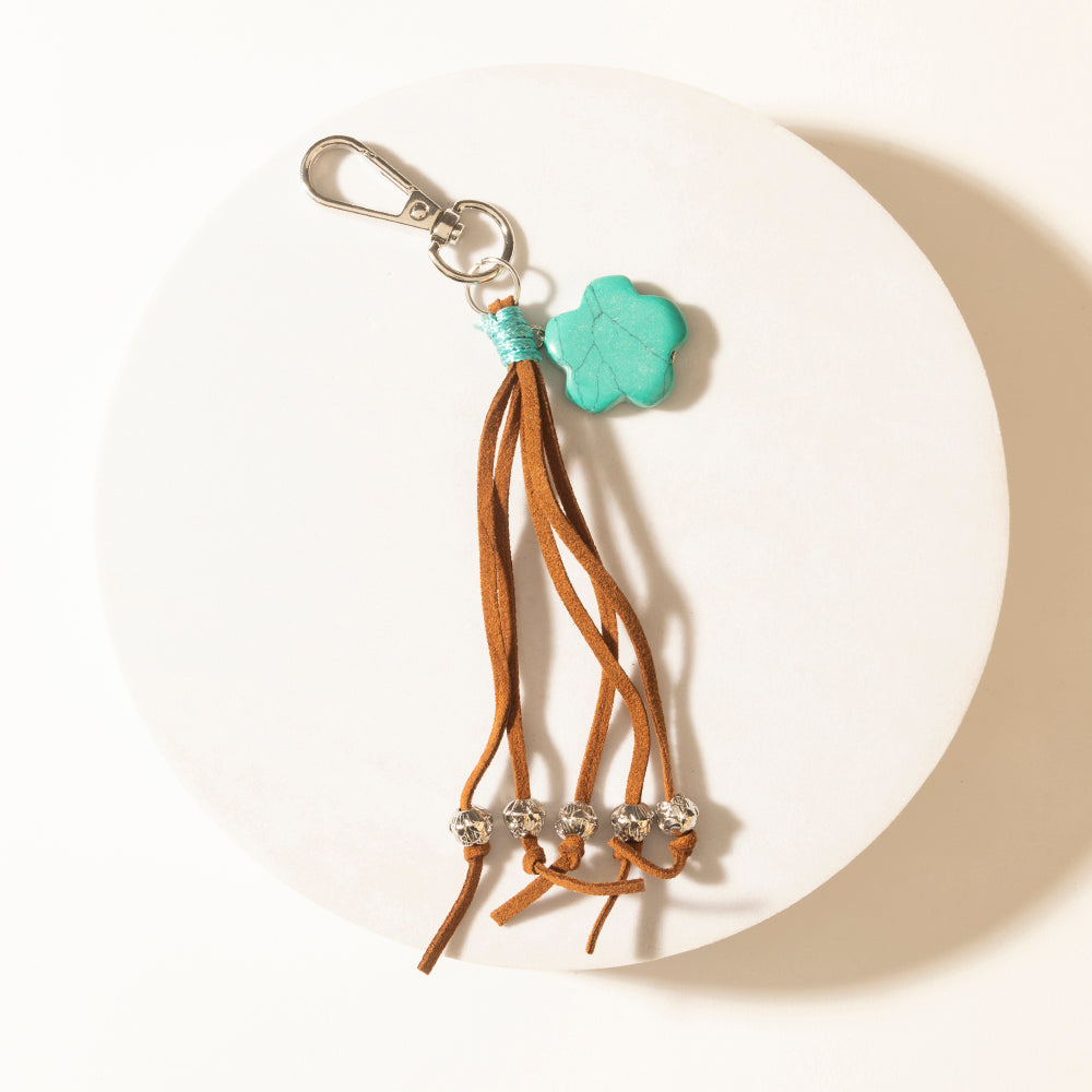 Porte-clés Myra Rangeflower à pompon en daim marron