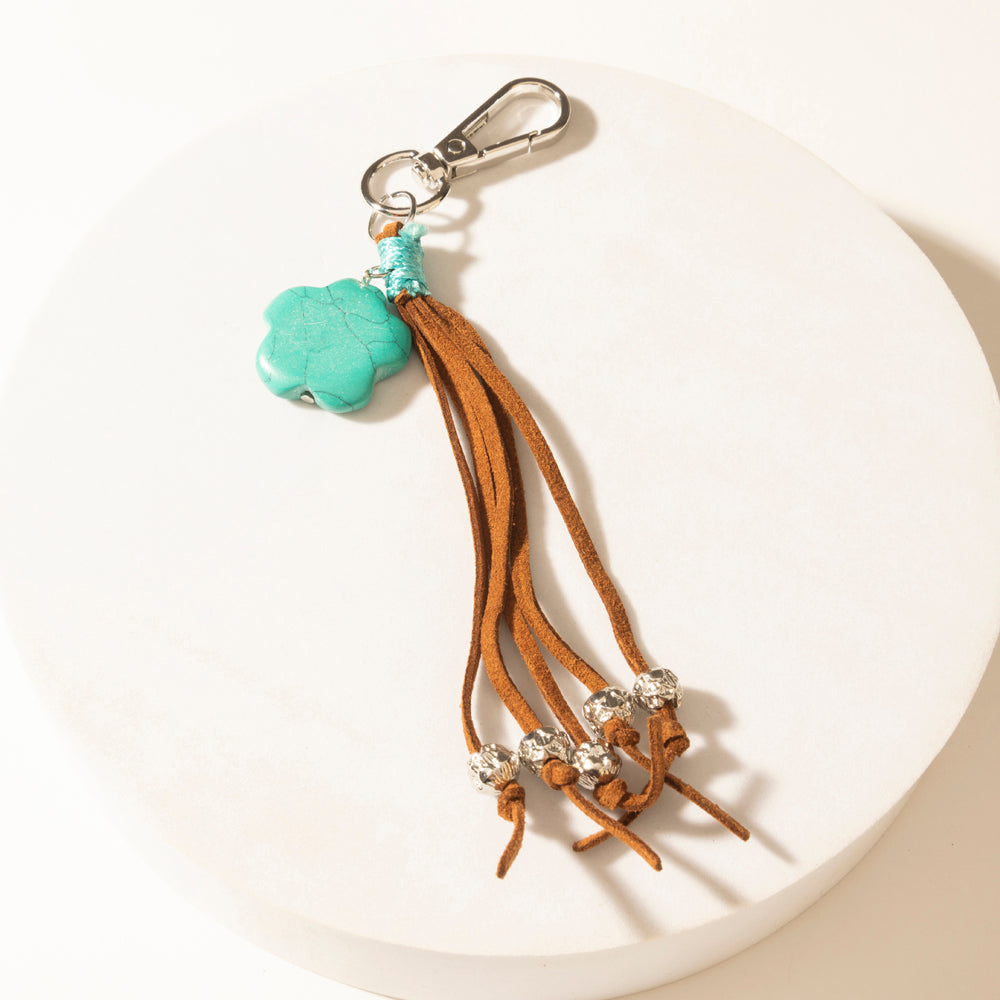 Porte-clés Myra Rangeflower à pompon en daim marron