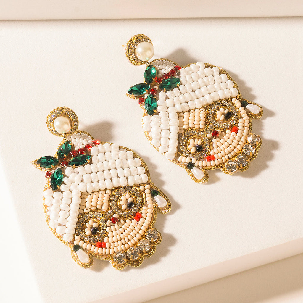 Boucles d'oreilles Charm de Myra St. Nick en ivoire clair de lune