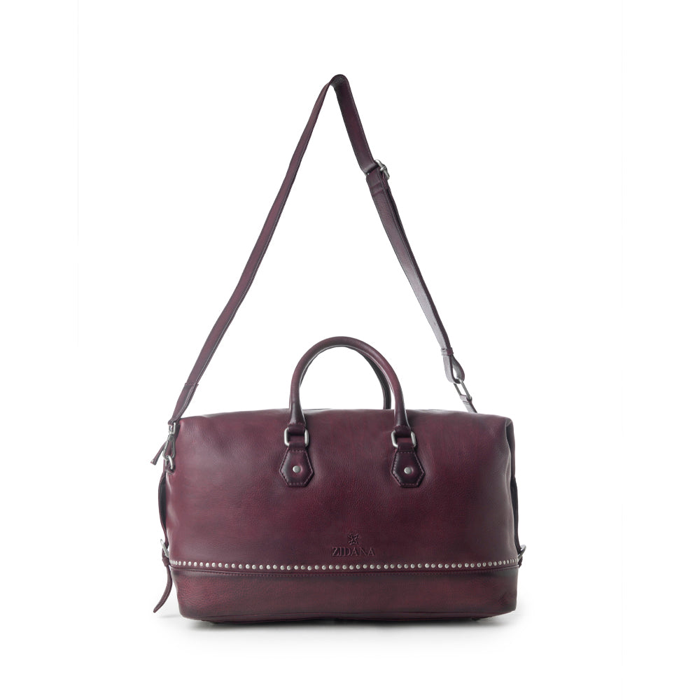 Sac de voyage Myra Zidana en cuir tanné végétal coloris Dusty Berry