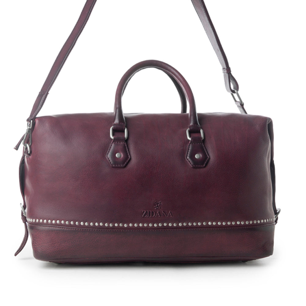 Sac de voyage Myra Zidana en cuir tanné végétal coloris Dusty Berry