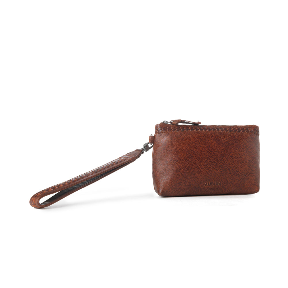 Pochette de poignet Myra Zidana Ethel en cuir au tannage végétal, coloris Redwood