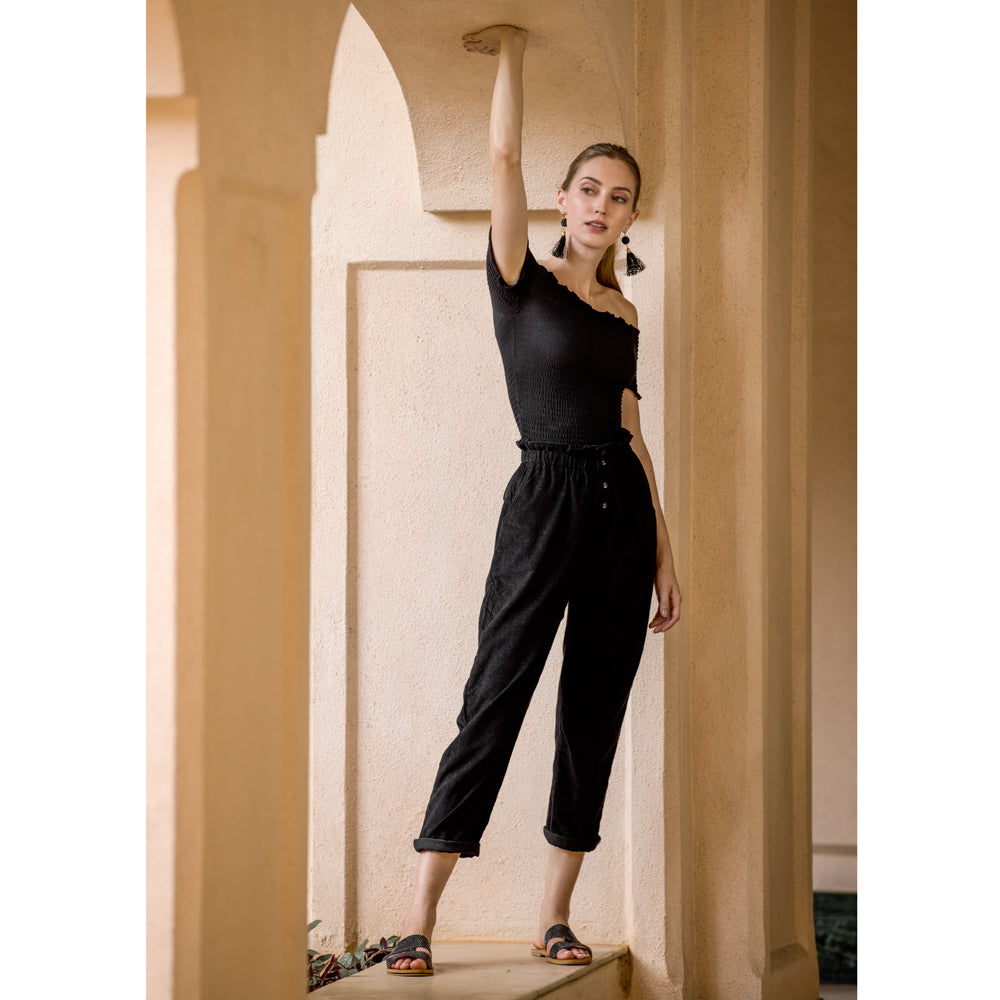 Pantalon noir en velours côtelé