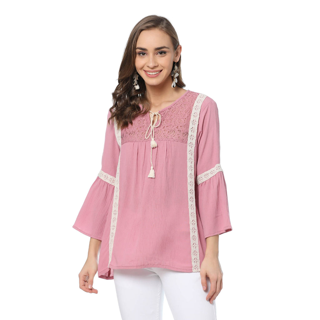 Haut rose en résille