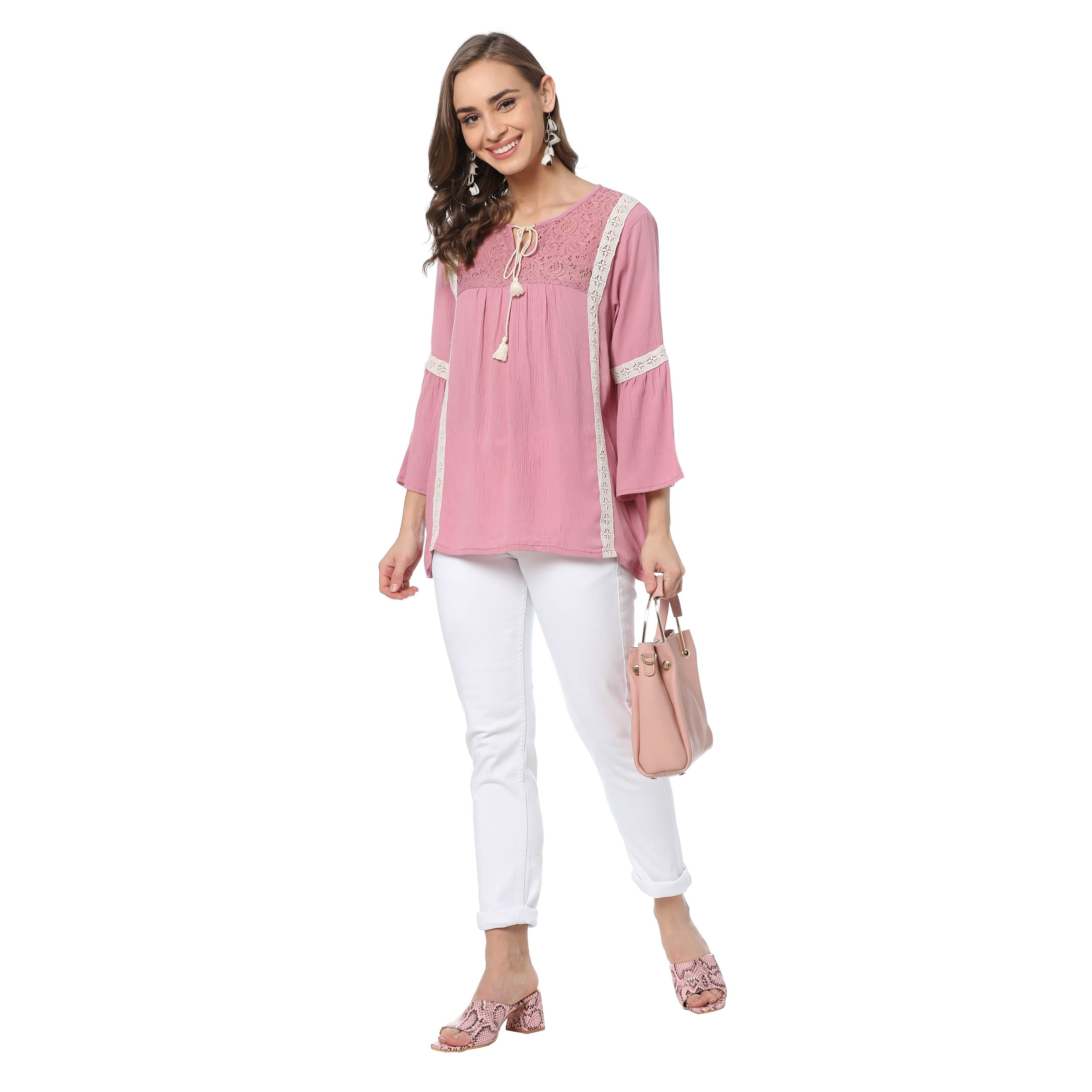 Haut rose en résille