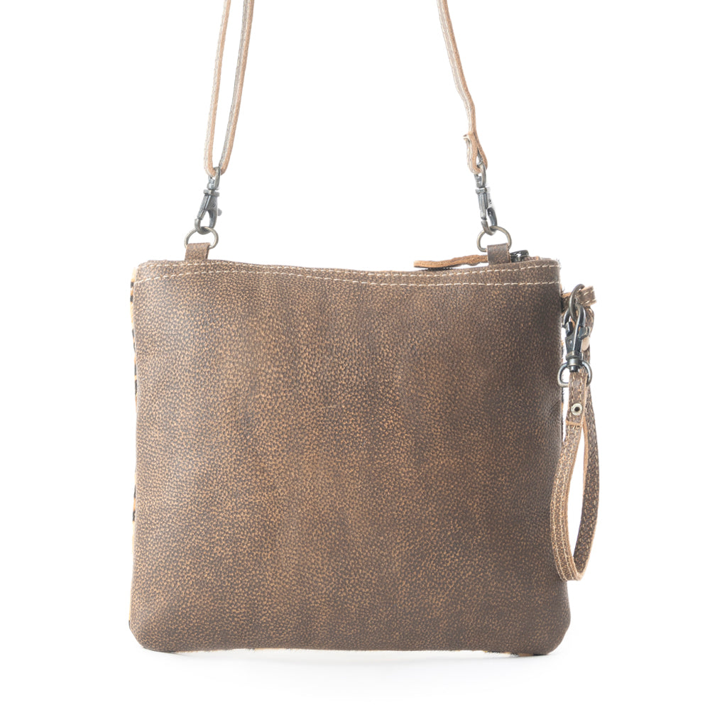 Sac en cuir tacheté et poil de vache
