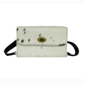 PORTEFEUILLE EN CUIR CHEVELU MONOCHROME