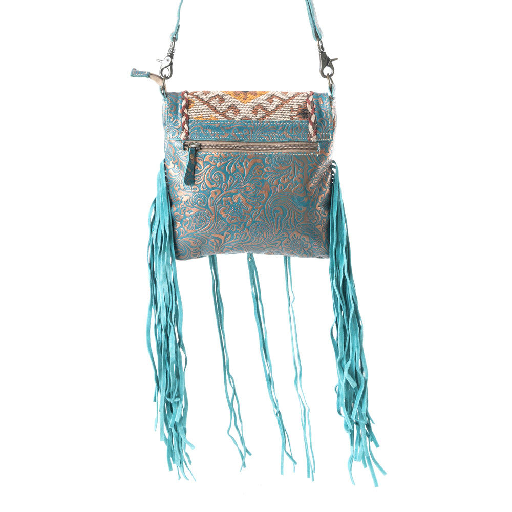 Sac marin en cuir et poils de vache