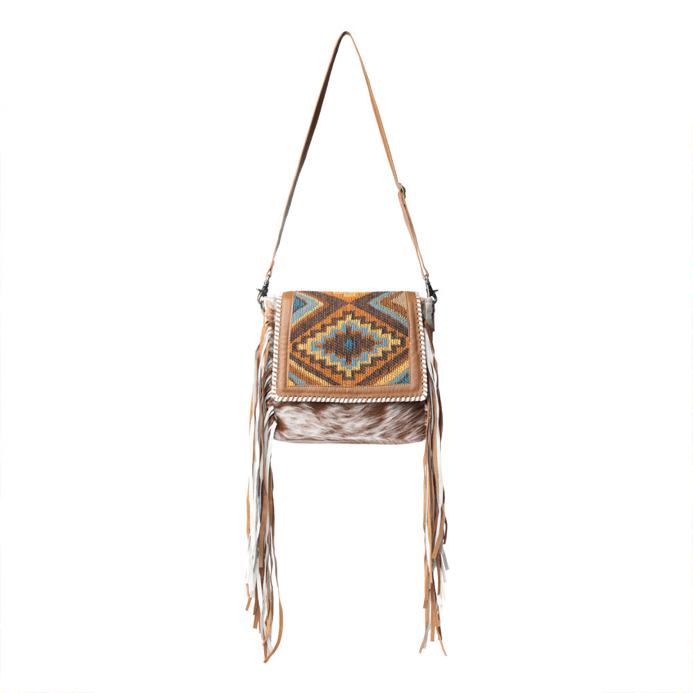 Sac en cuir et poils de vachette de style bohème chic