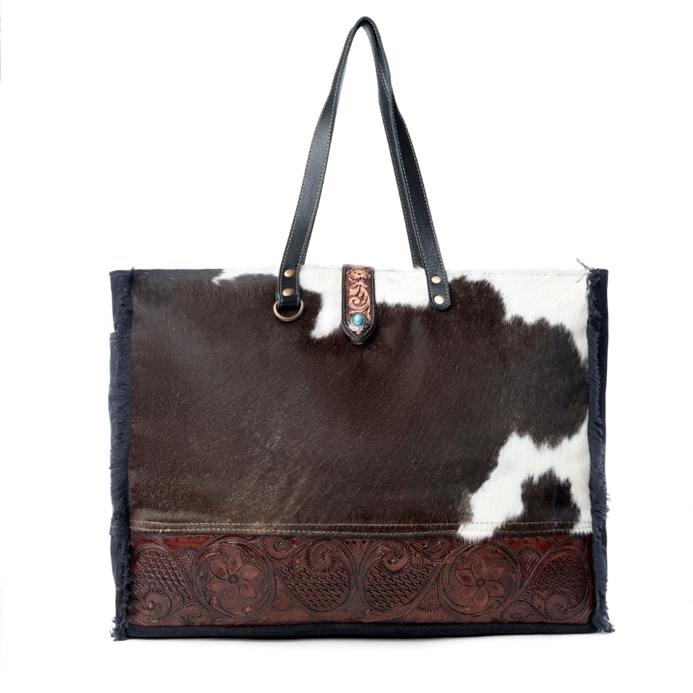 Joli sac en cuir repoussé