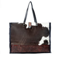 Joli sac en cuir repoussé