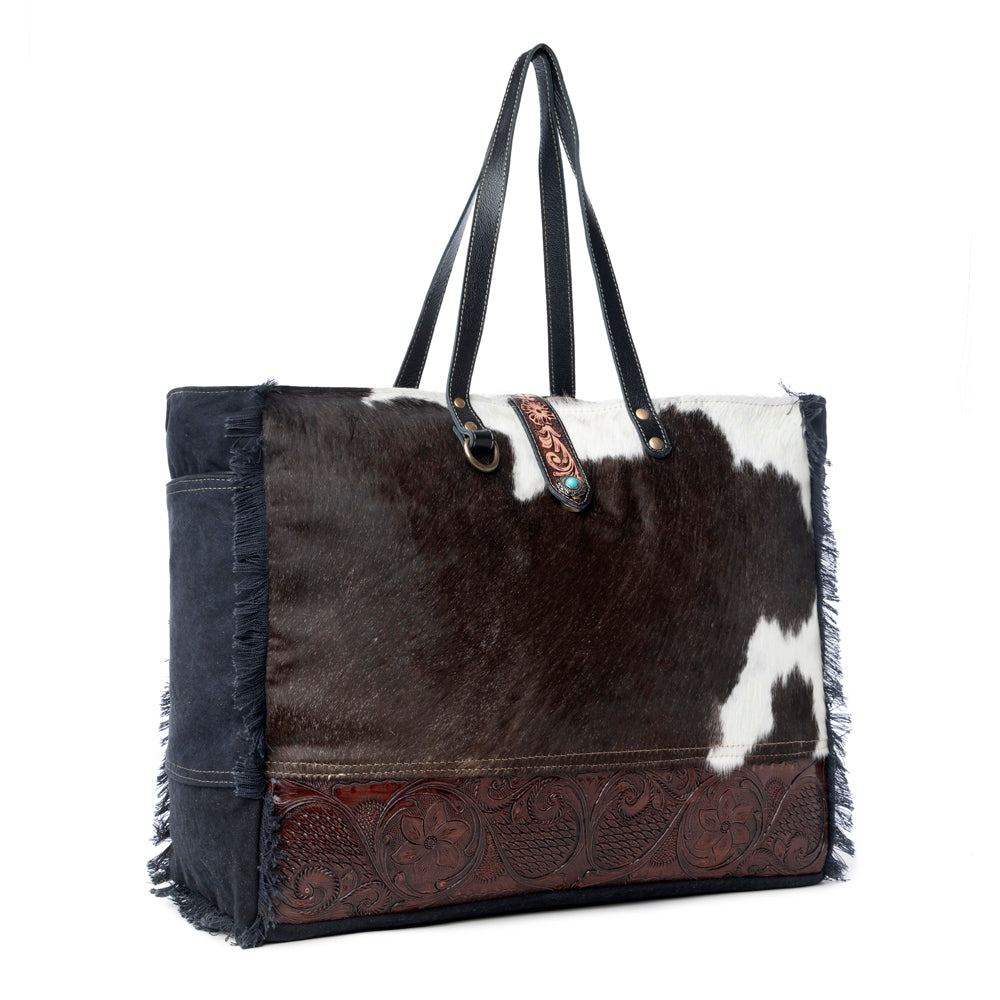 Joli sac en cuir repoussé