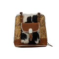 Sac à dos en toile et cuir de vachette à motif herbes des prairies.