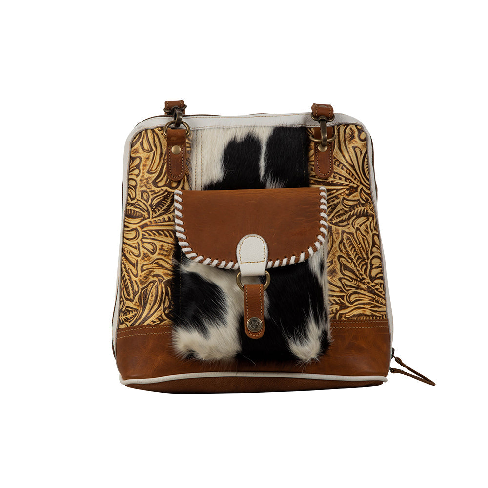 Sac à dos en toile et cuir de vachette à motif herbes des prairies.