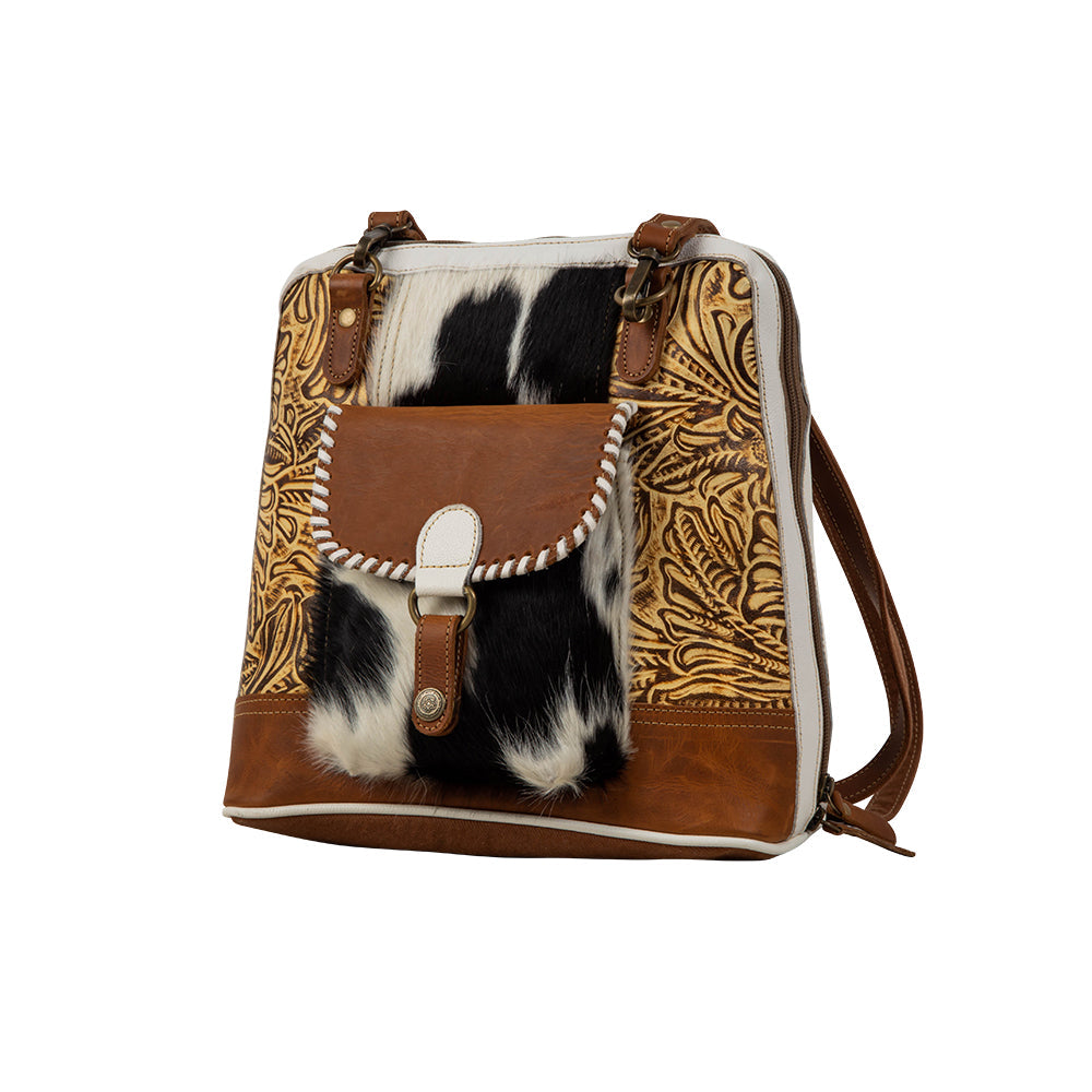Sac à dos en toile et cuir de vachette à motif herbes des prairies.