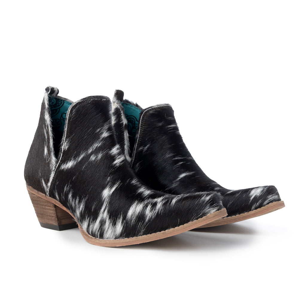 Bottes Sunset Bloom en cuir de vachette fendu noir et blanc
