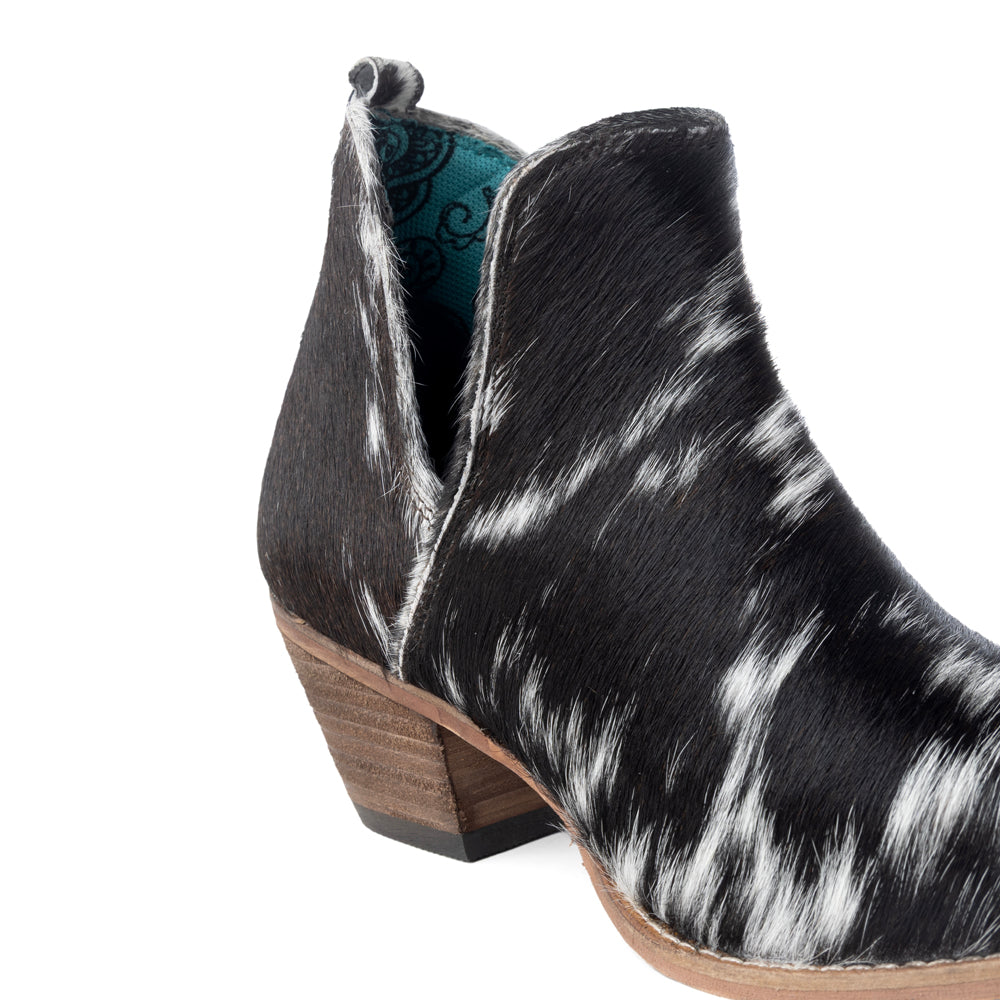 Bottes Sunset Bloom en cuir de vachette fendu noir et blanc