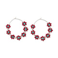Boucles d'oreilles créoles avec pierres précieuses « Cercle de fleurs »