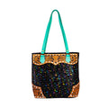 Sac à bandoulière Myra Galaxy Fire, corps noir scintillant, sangles en cuir aqua, ciselé à la main