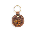 Porte-clés en cuir repoussé motif bouton d'or