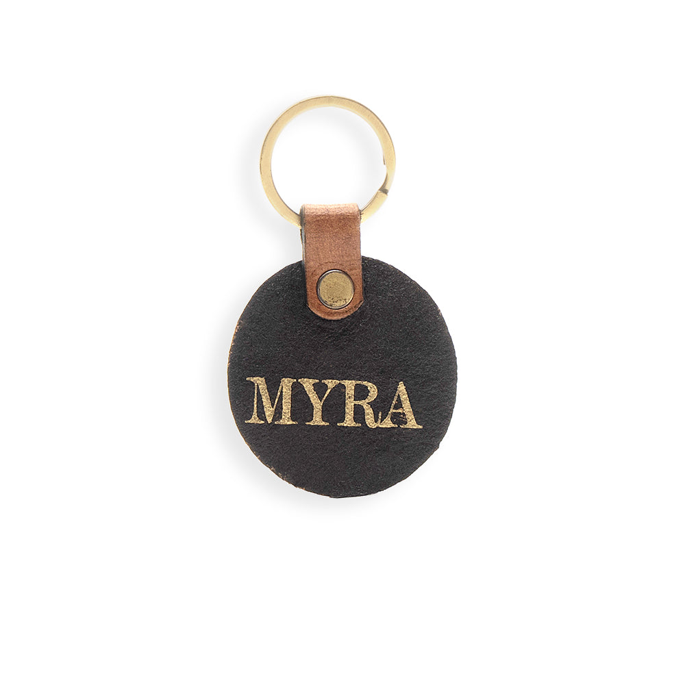 Porte-clés en cuir repoussé motif bouton d'or