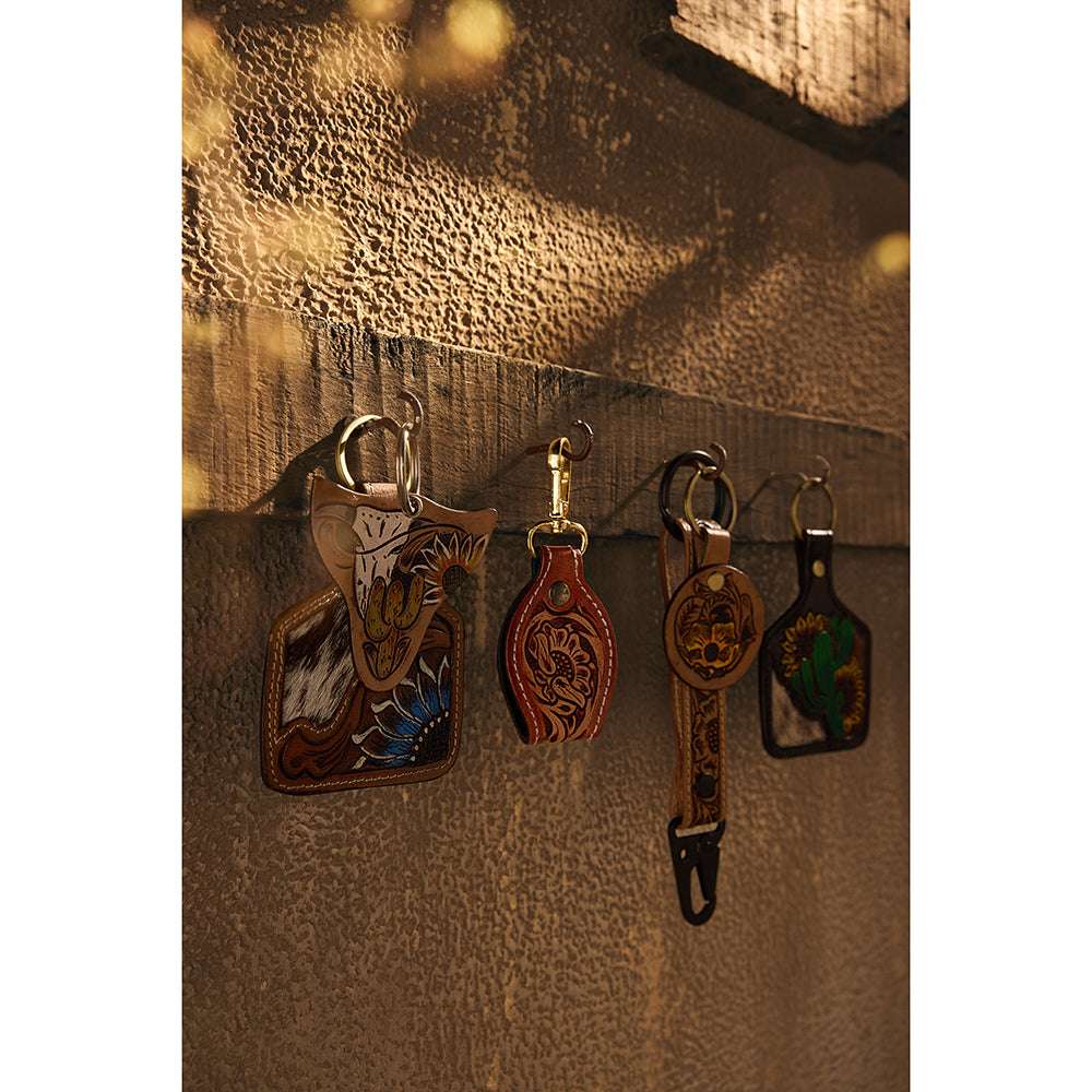 Porte-clés en cuir repoussé motif bouton d'or