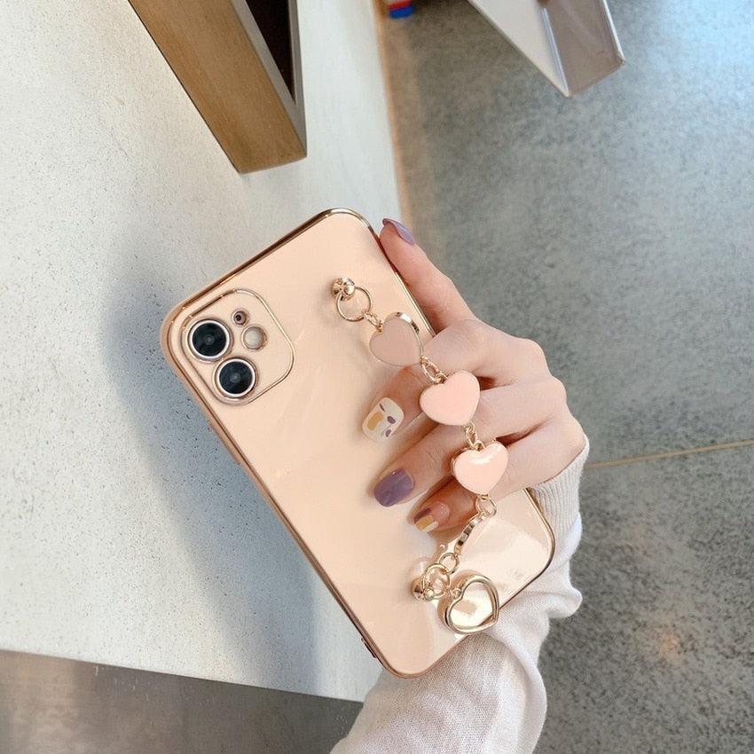 Coque de luxe en silicone pour femme avec bracelet chaîne pour iPhone, coque bracelet pour iPhone 13 12 11 Pro Max, coques avec chaîne en cœur pour iPhone 7 8 Plus XR XS Max X