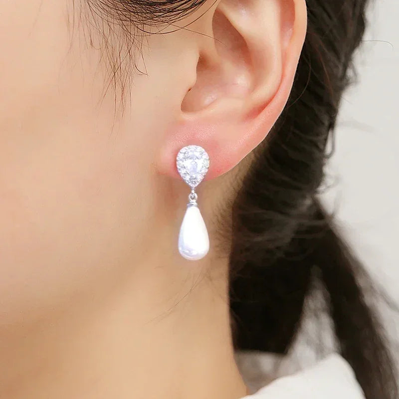 ZAKOL Élégantes Boucles d'Oreilles Pendantes Goutte d'Eau en Perles d'Imitation et Oxyde de Zirconium pour Femme, Bijoux de Mariage